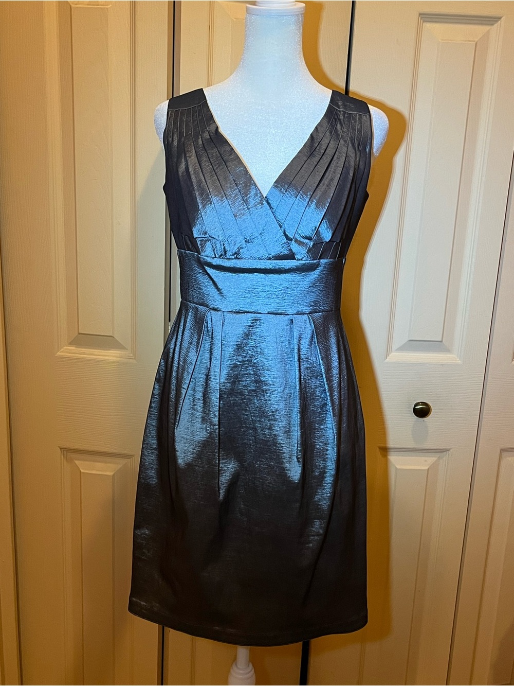 Calvin Klein cocktail dress. Silver metallic. Pleated front. Sleeveless. Size S